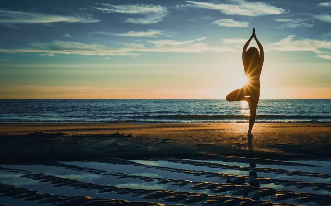 Silhouette performing yoga pose at seaside sunset 2026 09 23 01 45 39 utc